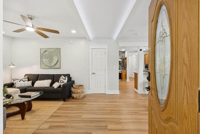 1237 Abiff Rd, Bon Aqua, TN 37025 - living room featuring a ceiling fan, light wood-style floors, and beamed ceiling