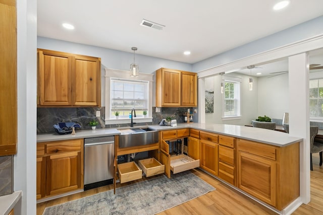 1237 Abiff Rd, Bon Aqua, TN 37025 - kitchen featuring dishwasher, light wood-style flooring, healthy amount of natural light, and recessed lighting