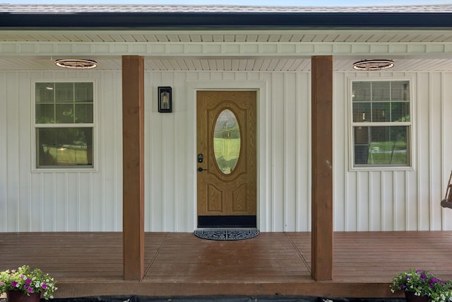 1237 Abiff Rd, Bon Aqua, TN 37025 - property entrance with a porch and board and batten siding