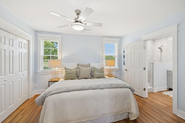 1237 Abiff Rd, Bon Aqua, TN 37025 - bedroom featuring light wood-style flooring, a closet, and ceiling fan