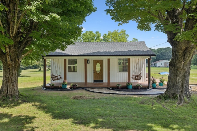 1237 Abiff Rd, Bon Aqua, TN 37025 - view of front of house with a shingled roof and a front lawn