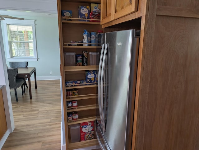 1237 Abiff Rd, Bon Aqua, TN 37025 - kitchen with freestanding refrigerator, light wood-type flooring, and ceiling fan