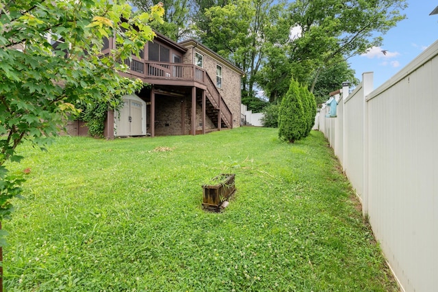 2957 Stewart Campbell Pt, Spring Hill, TN 37174 - fenced backyard with stairs, a wooden deck, and a storage shed