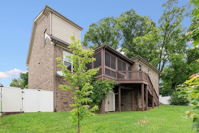 2957 Stewart Campbell Pt, Spring Hill, TN 37174 - rear view of house featuring brick siding, stairway, and a sunroom
