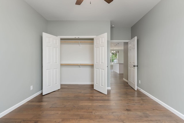 1554 Duncans Chapel Rd, Cookeville, TN 38506 - unfurnished bedroom with wood finished floors, a closet, and a ceiling fan