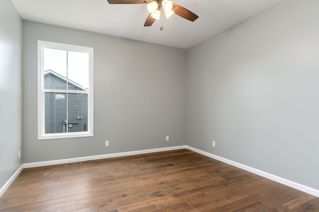 1554 Duncans Chapel Rd, Cookeville, TN 38506 - empty room with a ceiling fan and dark wood finished floors