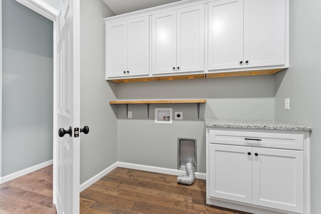 1554 Duncans Chapel Rd, Cookeville, TN 38506 - washroom featuring hookup for an electric dryer, cabinet space, washer hookup, and dark wood-type flooring