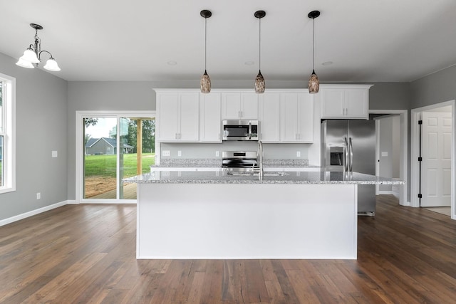 1554 Duncans Chapel Rd, Cookeville, TN 38506 - kitchen featuring stainless steel appliances, an island with sink, white cabinets, and dark wood-style flooring