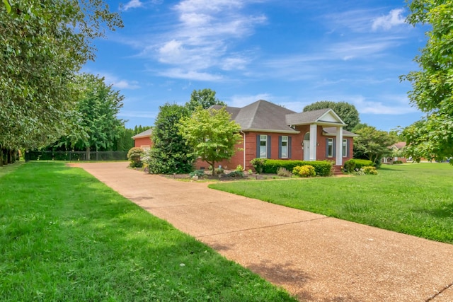 822 Old Jefferson Pike, Smyrna, TN 37167 - greek revival house with brick siding, a front yard, and a shingled roof