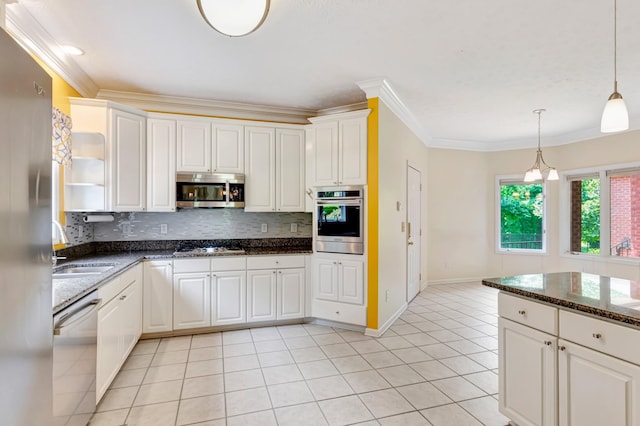 822 Old Jefferson Pike, Smyrna, TN 37167 - kitchen with appliances with stainless steel finishes, light tile patterned flooring, backsplash, decorative light fixtures, and crown molding