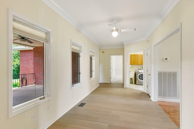 822 Old Jefferson Pike, Smyrna, TN 37167 - hallway with washer / dryer, light wood finished floors, and ornamental molding