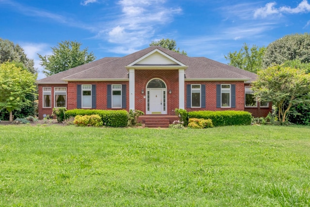 822 Old Jefferson Pike, Smyrna, TN 37167 - neoclassical home featuring a front yard, brick siding, and roof with shingles