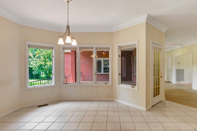 822 Old Jefferson Pike, Smyrna, TN 37167 - empty room featuring crown molding, light tile patterned floors, and a chandelier