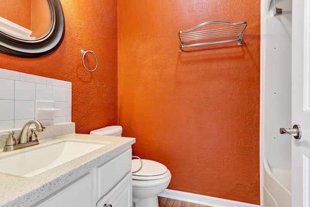 822 Old Jefferson Pike, Smyrna, TN 37167 - bathroom with vanity, a textured wall, and wood finished floors