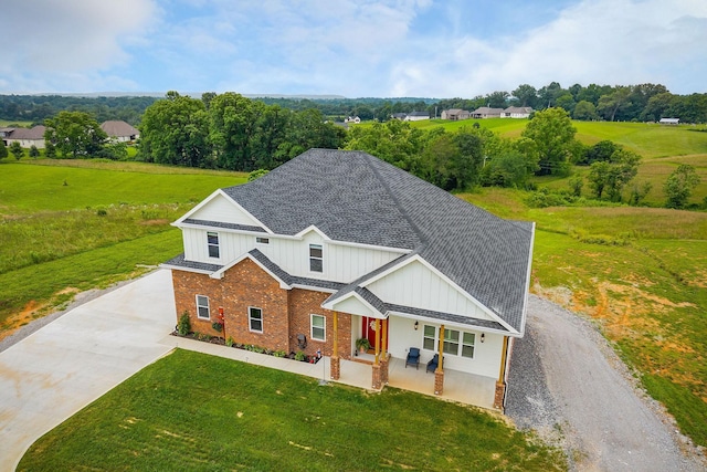 613 Blue Water Dr, Cookeville, TN 38506 - view of front of property with driveway, board and batten siding, and a front lawn