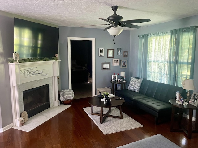 126 Kimberly St, Portland, TN 37148 - living area with a high end fireplace, wood finished floors, a ceiling fan, and a textured ceiling