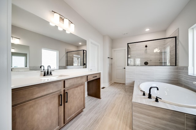 7274 Fairlawn Dr, Fairview, TN 37062 - full bath with tiled shower, a bath, vanity, and recessed lighting
