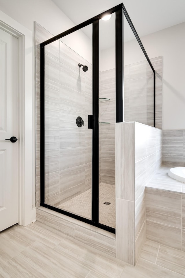 7274 Fairlawn Dr, Fairview, TN 37062 - full bath featuring a stall shower, tile patterned floors, and a tub to relax in
