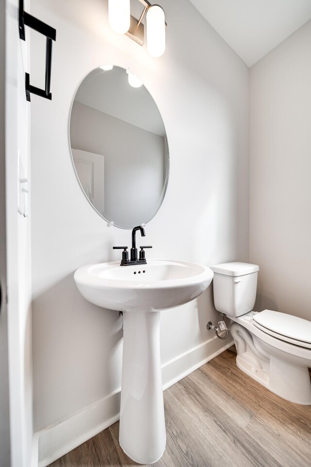 7274 Fairlawn Dr, Fairview, TN 37062 - half bath featuring baseboards and wood finished floors
