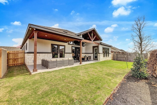 7235 Fairlawn Dr, Fairview, TN 37062 - rear view of house with stucco siding, stone siding, an outdoor hangout area, and a fenced backyard
