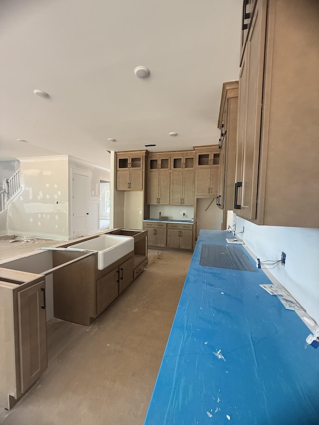 7253 Fairlawn Dr, Fairview, TN 37062 - kitchen featuring unfinished concrete flooring, black electric stovetop, glass insert cabinets, and a kitchen island