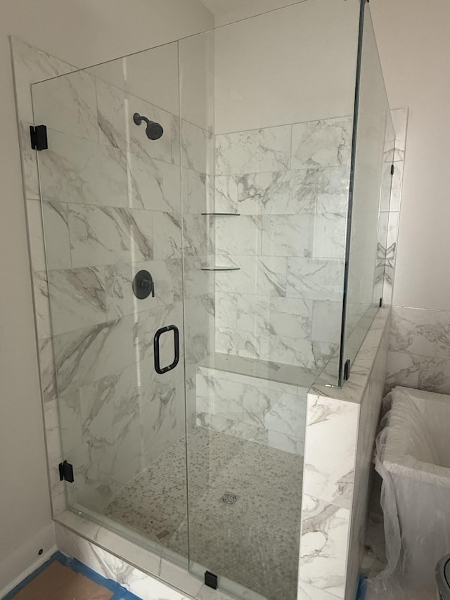 7253 Fairlawn Dr, Fairview, TN 37062 - full bathroom featuring a marble finish shower and marble finish floors