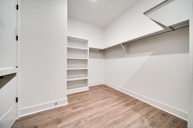 7267 Fairlawn Dr, Fairview, TN 37062 - spacious closet featuring wood finished floors