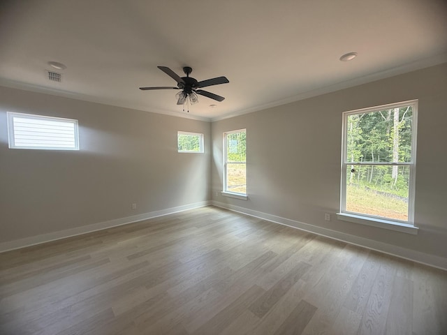 7267 Fairlawn Dr, Fairview, TN 37062 - spare room featuring crown molding, light wood-style flooring, and a ceiling fan