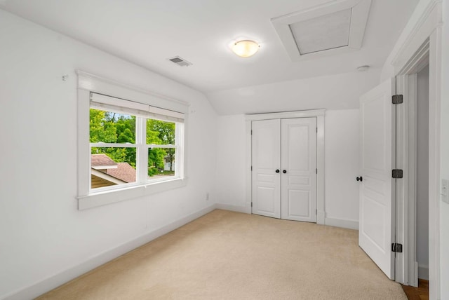 162 Woodmont Blvd, Nashville, TN 37205 - unfurnished bedroom with light carpet, attic access, a closet, and vaulted ceiling