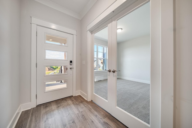 7266 Fairlawn Dr, Fairview, TN 37062 - entrance foyer featuring french doors, wood finished floors, and ornamental molding