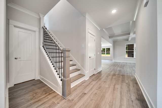 7266 Fairlawn Dr, Fairview, TN 37062 - stairs featuring wood finished floors, crown molding, coffered ceiling, beam ceiling, and recessed lighting