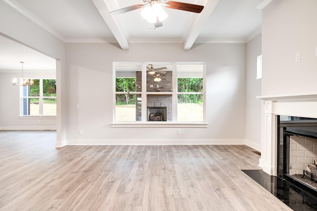 7266 Fairlawn Dr, Fairview, TN 37062 - unfurnished living room with a fireplace, ceiling fan, healthy amount of natural light, beam ceiling, and ornamental molding