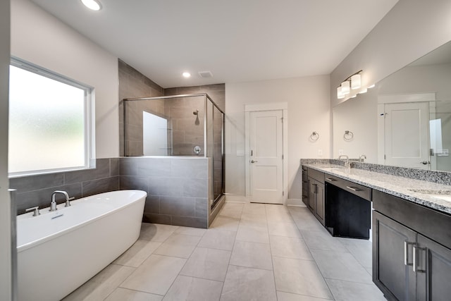 7266 Fairlawn Dr, Fairview, TN 37062 - full bath with a shower stall, a freestanding tub, double vanity, tile patterned flooring, and recessed lighting