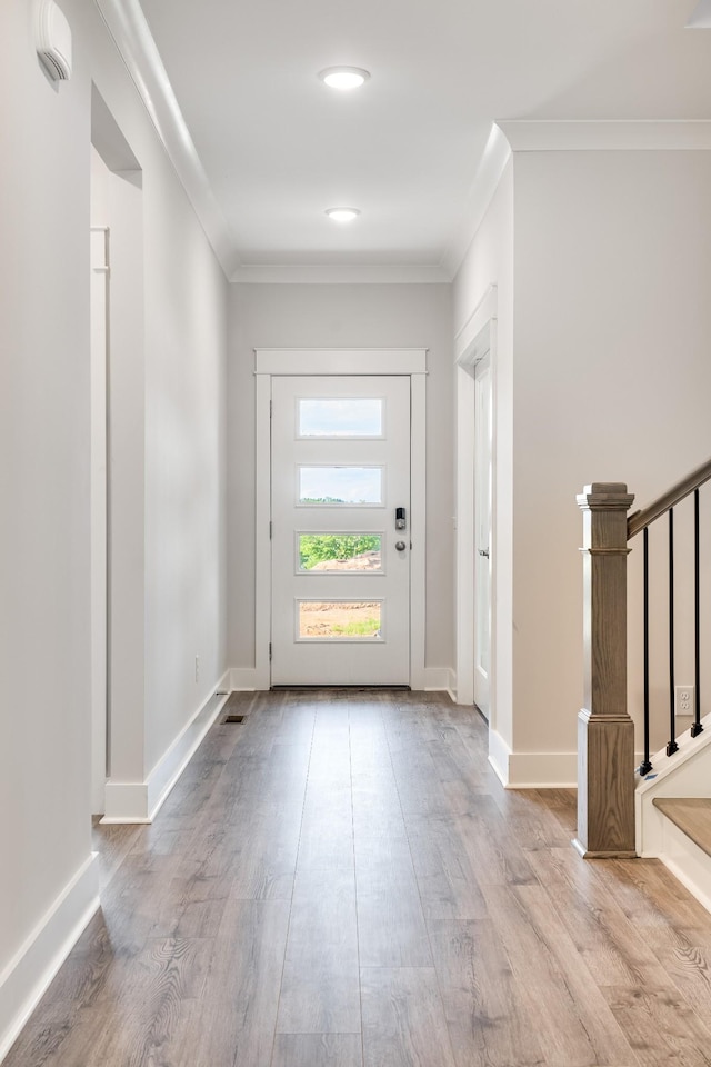 7266 Fairlawn Dr, Fairview, TN 37062 - foyer entrance with stairway, ornamental molding, and wood finished floors