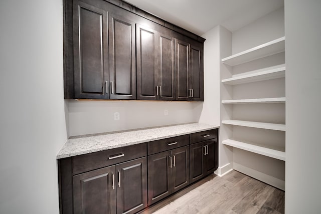 7266 Fairlawn Dr, Fairview, TN 37062 - kitchen with light wood-type flooring, dark brown cabinetry, and open shelves
