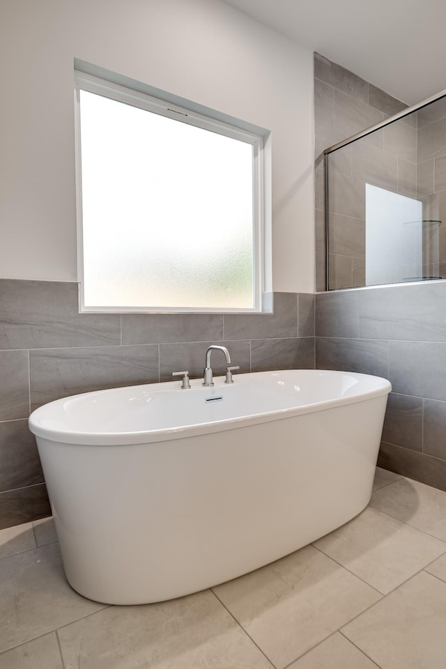 7266 Fairlawn Dr, Fairview, TN 37062 - full bath featuring tile walls, a freestanding bath, and tile patterned flooring