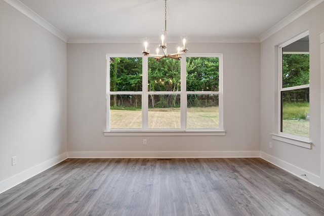 7266 Fairlawn Dr, Fairview, TN 37062 - empty room with a chandelier, ornamental molding, and wood finished floors