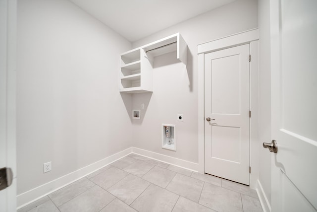 7266 Fairlawn Dr, Fairview, TN 37062 - washroom featuring hookup for an electric dryer, washer hookup, and light tile patterned flooring