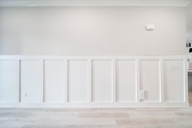 7233 Richvale Dr W, Fairview, TN 37062 - detailed view of a decorative wall, wood finished floors, and a wainscoted wall