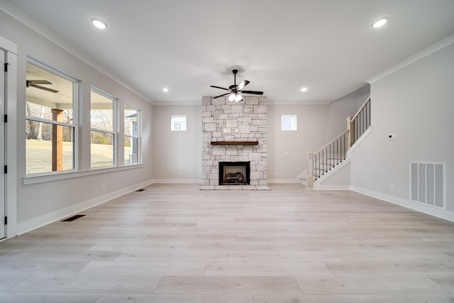 7233 Richvale Dr W, Fairview, TN 37062 - unfurnished living room featuring a ceiling fan, crown molding, stairs, recessed lighting, and light wood-style flooring