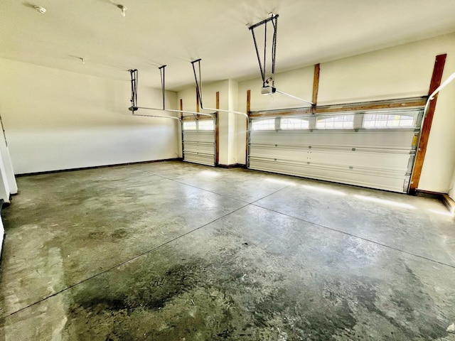 7233 Richvale Dr W, Fairview, TN 37062 - garage with a garage door opener and baseboards