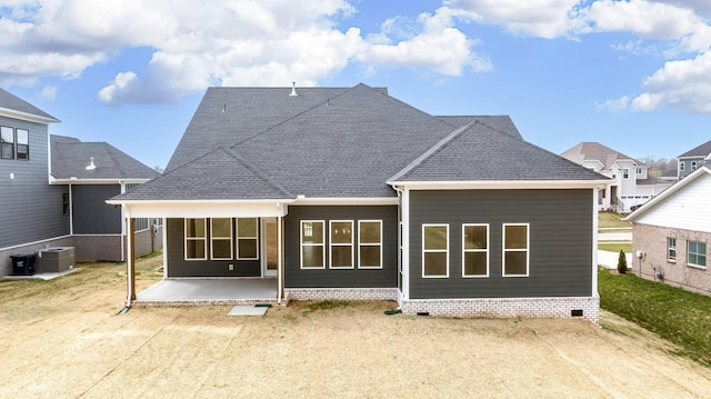 7233 Richvale Dr W, Fairview, TN 37062 - rear view of property featuring a patio, a shingled roof, and crawl space