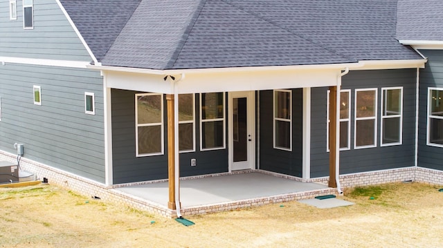 7233 Richvale Dr W, Fairview, TN 37062 - rear view of house with a shingled roof and a patio area