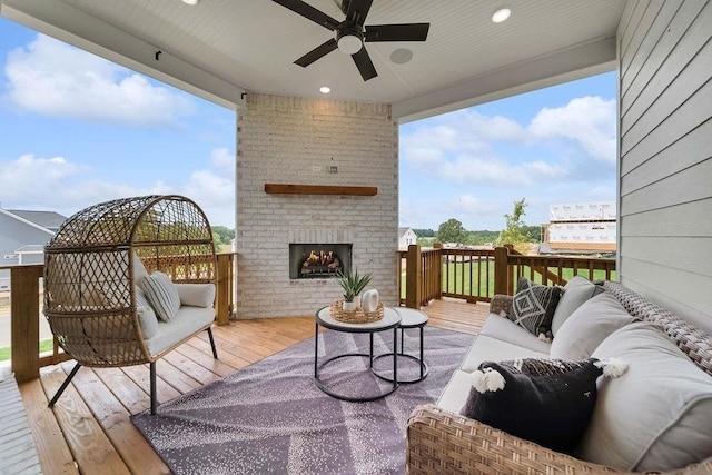 7428 Twill Heights Loop W, Fairview, TN 37062 - wooden deck featuring an outdoor living space with a fireplace and ceiling fan