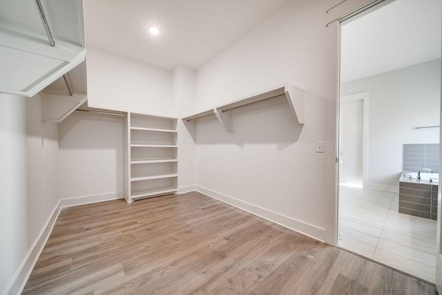 7262 Fairlawn Dr, Fairview, TN 37062 - walk in closet with wood finished floors