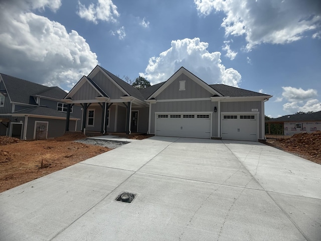 7262 Fairlawn Dr, Fairview, TN 37062 - craftsman-style home with board and batten siding, concrete driveway, and a garage