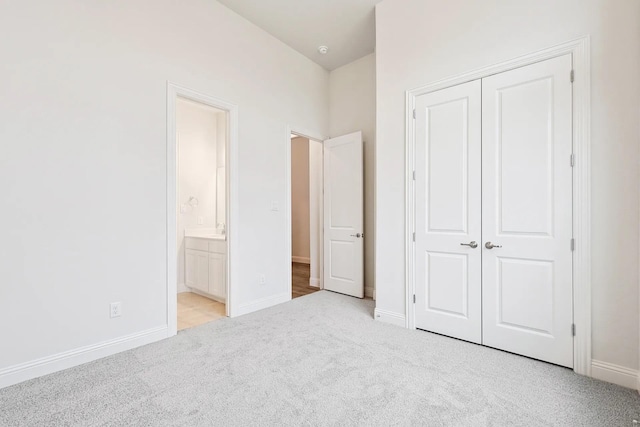 7261 Fairlawn Dr, Fairview, TN 37062 - unfurnished bedroom with light carpet, a closet, and connected bathroom