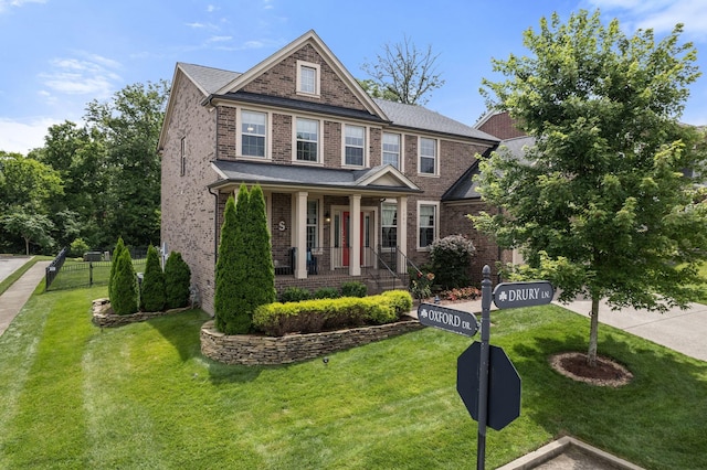 1301 Drury Ln, Mount Juliet, TN 37122 - view of front of property with brick siding, a porch, and a front yard