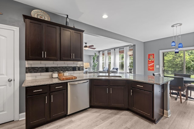 1301 Drury Ln, Mount Juliet, TN 37122 - kitchen featuring stainless steel dishwasher, dark brown cabinets, light wood finished floors, healthy amount of natural light, and recessed lighting