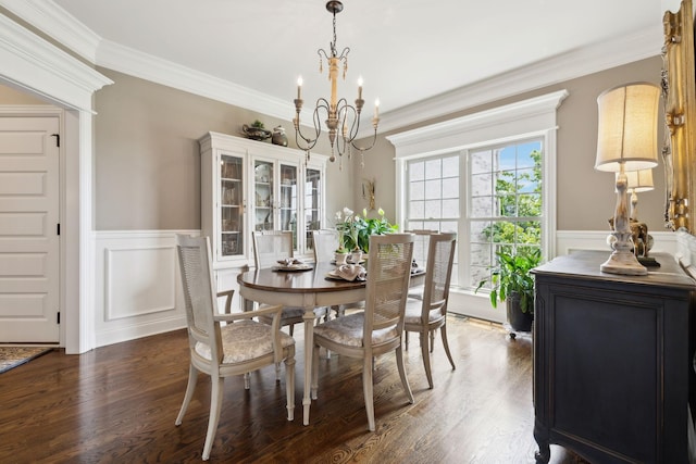 624 Twin View Dr, Murfreesboro, TN 37128 - dining room featuring a chandelier, wainscoting, wood finished floors, ornamental molding, and a decorative wall